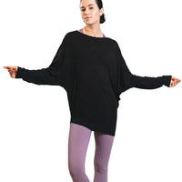 Woman wearing a bamboo black dolman candian made.top.