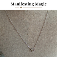 Manifesting Magic A Little Luck Clover Necklace in Silver and Gold