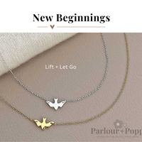 New Beginnings Flying Bird Necklace in Silver and Gold