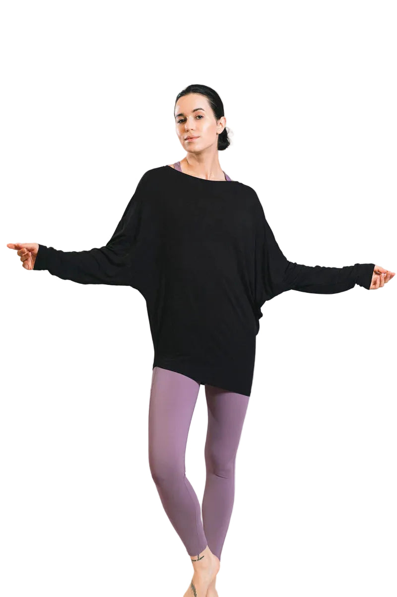 Woman wearing a bamboo  black dolman  candian made.top.